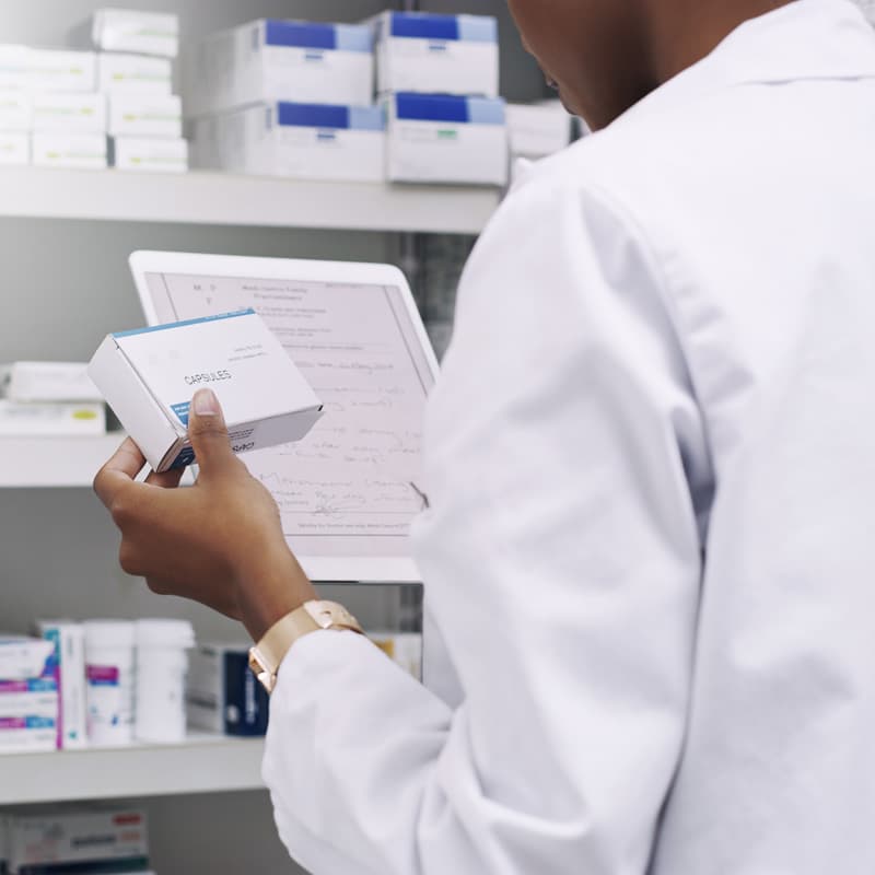 pharmacist filling a prescription