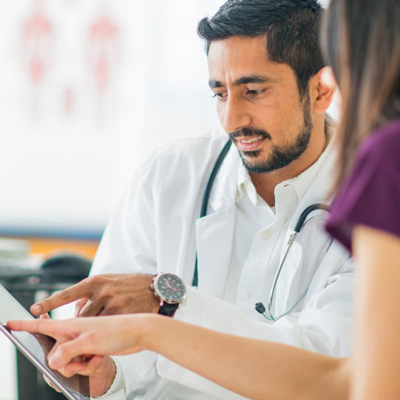 doctor using tablet