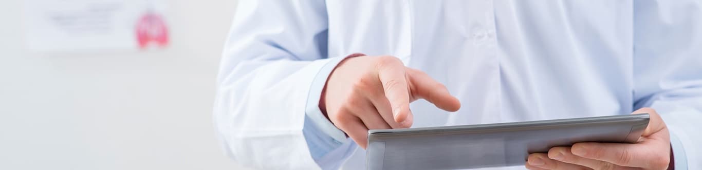 Doctor holding tablet