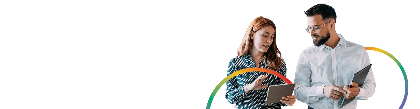 A man and woman looking at the results of Ricoh commissioning IDC to survey 600+ leaders to better understand what was most critical to their future success.