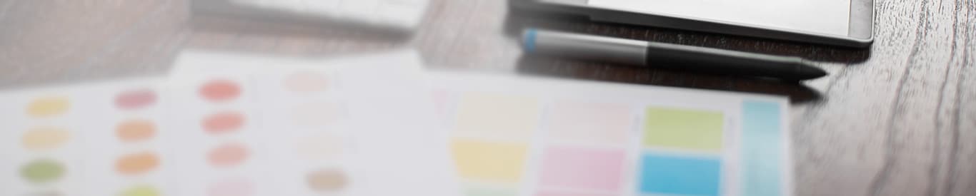 Photo of color swatches and a tablet.